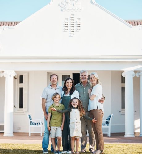 Happy big family, portrait and hug in real estate, new home or property investment on outdoor grass.